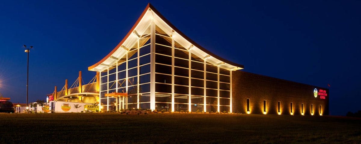 Miron Hero 1200x480 - View of building at night